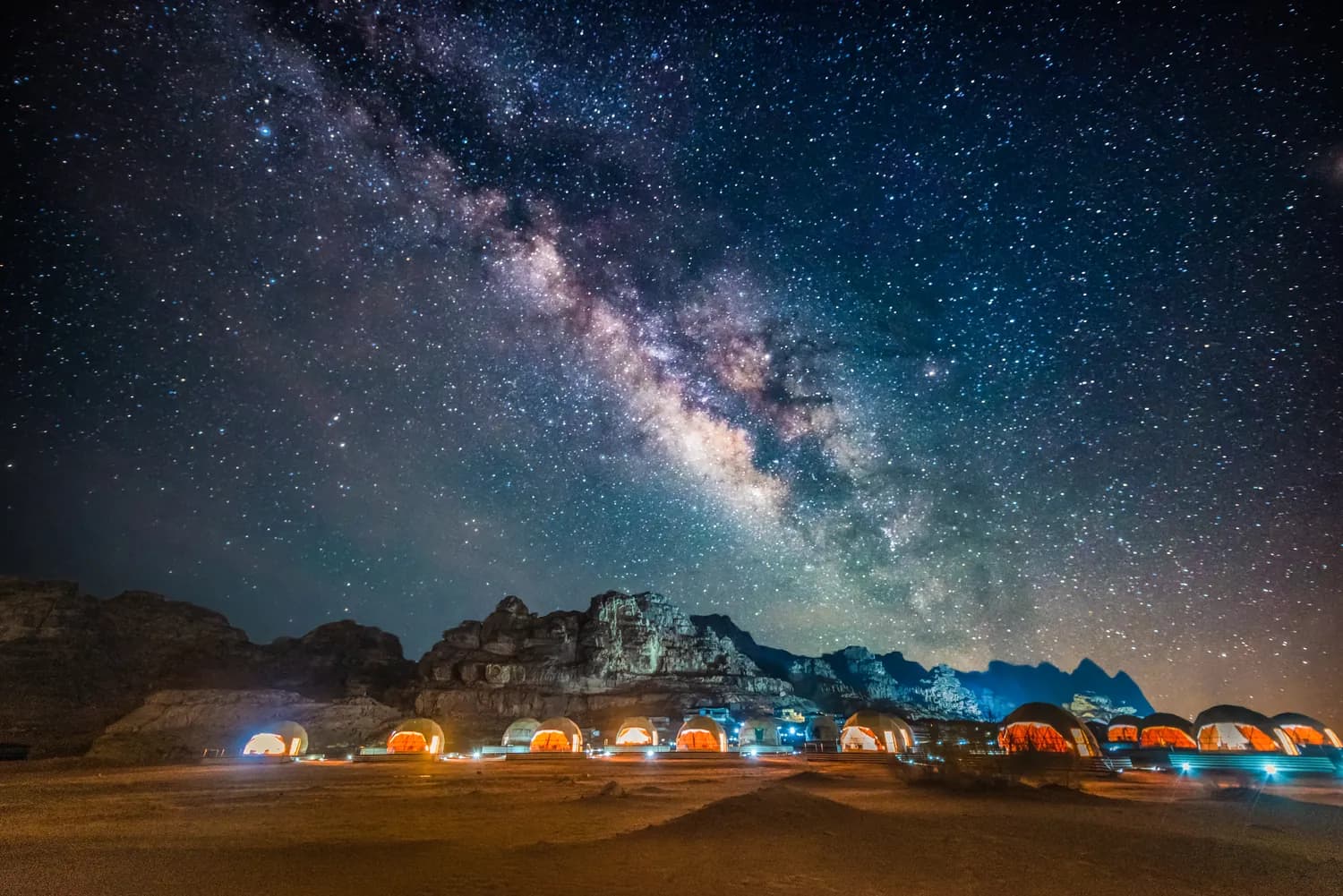 Desert camp under the Milky Way in Wadi Rum, Jordan
